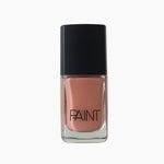 A bottle of Trival Blossom nail polish by Paint Nail Lacquer against a white backdrop, this shade is a medium creamy shade of orange and brown 