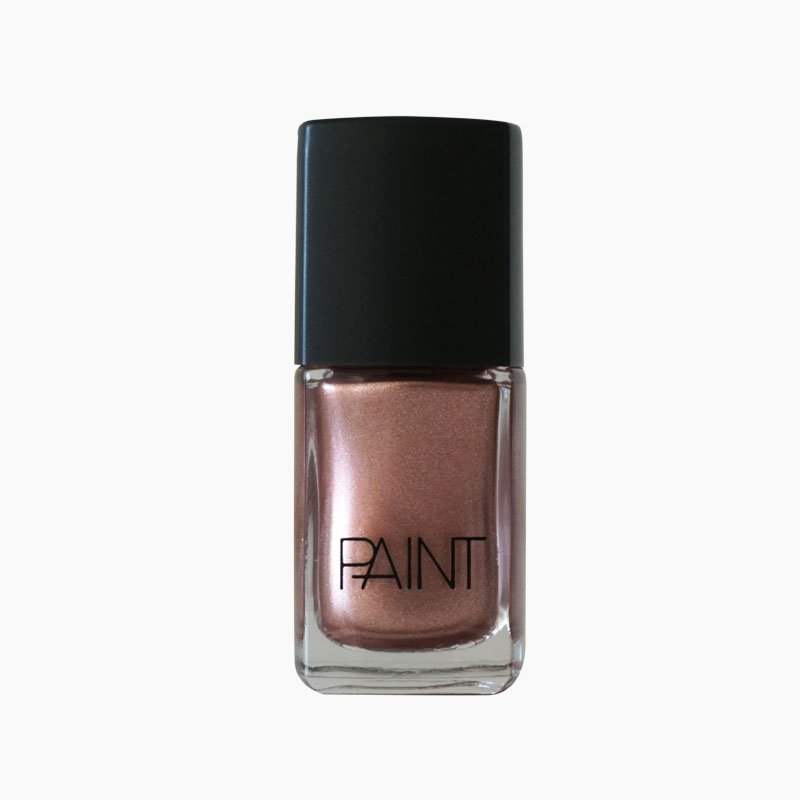 A bottle of Galactic Rose nail polish by Paint Nail Lacquer against a white backdrop, this shade is a metallic dark bronze shade with pink undertones.
