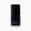 A bottle of Midnight Sky nail polish by Paint Nail Lacquer against a white backdrop, this shade is a dark blue.
