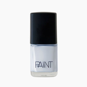 A bottle of Pale Glacier nail polish by Paint Nail Lacquer against a white backdrop, this shade is a light baby blue 